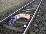 suicide on the train tracks.jpg