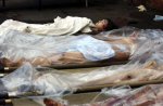 Relatives-Identify-Dead-Children-In-Vladikavkaz-Russia-Sept-2004-16.jpg